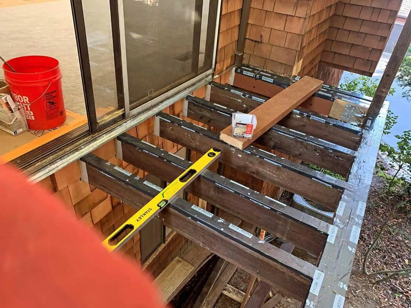 New deck installation with precise measurements and quality materials.